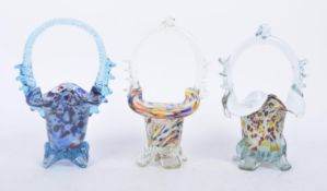 THREE RETRO MURANO STYLE GLASS BASKETS OF CANDY COLOURWAY
