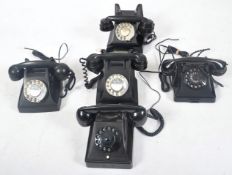 COLLECTION OF FIVE BLACK BAKELITE ROTARY TELEPHONES
