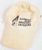 BANKSY - BANKSY VERSUS BRISTOL MUSEUM (2009) - PROMOTIONAL CAP
