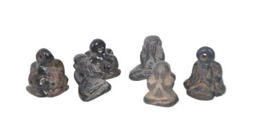 SIX EARLY 20TH CENTURY & LATER CARVED THAI PHRA PIDTA PENDANTS