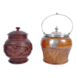 TWO 19TH CENTURY & LATER CARVED WOOD TOBACCO JARS