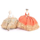 TWO EARLY 20TH CENTURY PORCELAIN DOLL PIN CUSHIONS