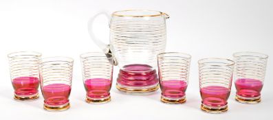 SET OF VINTAGE RETRO CRANBERRY DRINKING GLASSES WITH JUG