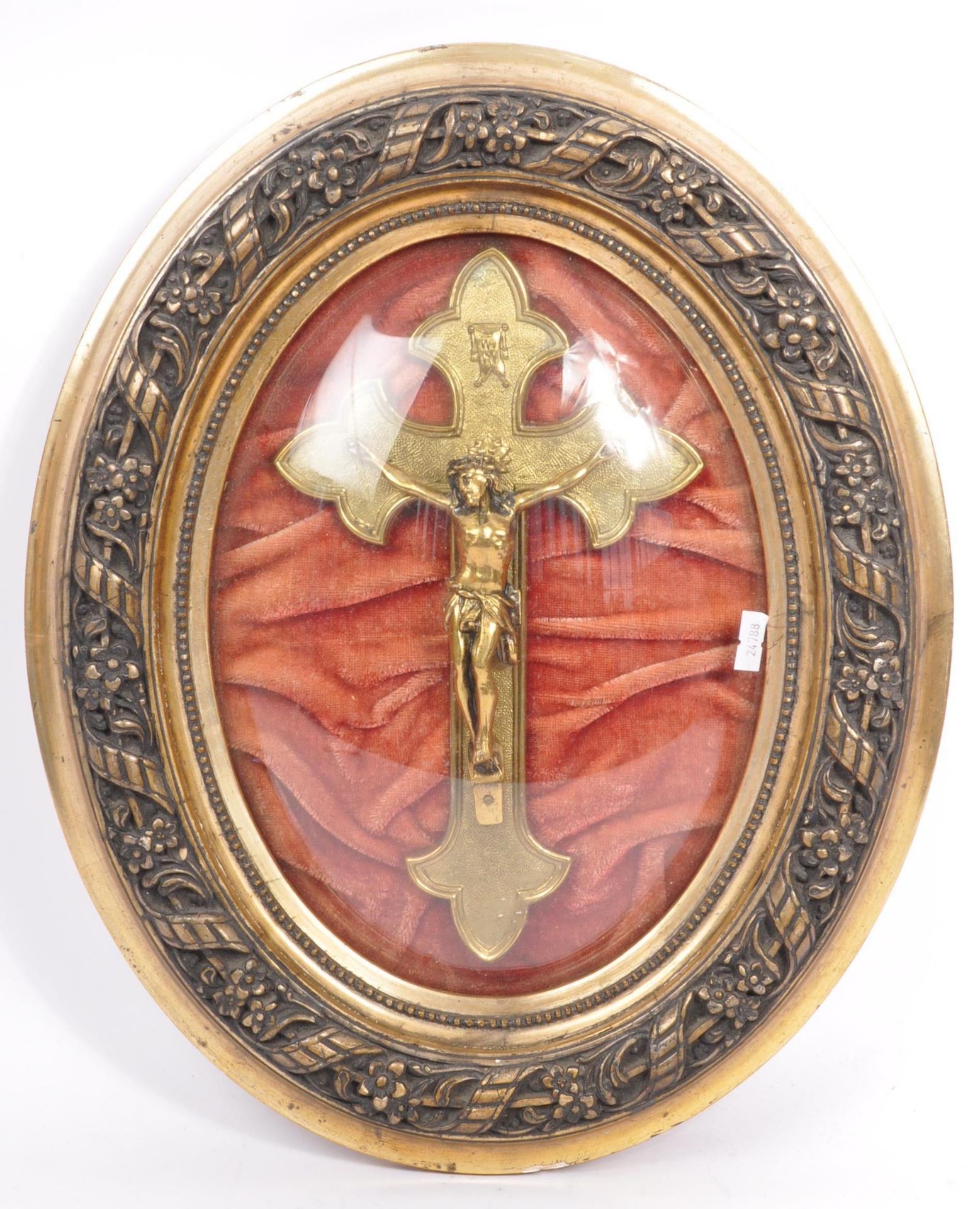 20TH CENTURY CATHOLIC GILT METAL CRUCIFIX IN DOMED FRAME