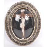 20TH CENTURY CATHOLIC STUCCO CRUCIFIX IN DOMED FRAME