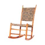 19TH CENTURY AESTHETIC MOVEMENT PASS THROUGH ROCKING CHAIR