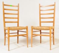 MANNER OF GIO PONTI FOR G-PLAN. PAIR RATTAN DINING CHAIRS