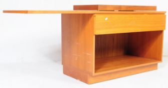 A RETRO MID CENTURY TEAK SIDE CABINET WITH SWIVEL TOP