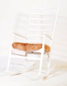 LATE 20TH CENTURY WHITE STICK BACK DANISH STYLE ROCKING CHAIR