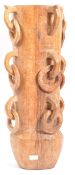 A VINTAGE 20TH CENTURY HAND CARVED WOODEN RING VASE