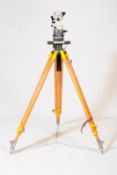 A HILGER & WATTS MICROPTIC THEODOLITE WITH TRIPOD STAND / CASE