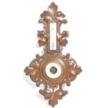 20TH CENTURY BLACK FOREST CARVED OAK BAROMETER