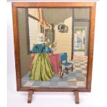 A MID CENTURY OAK FRAMED & EMBROIDERED FIRE GUARD