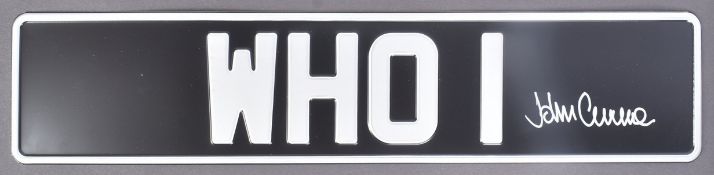 DOCTOR WHO (TV SERIES) - JOHN LEVEN SIGNED NUMBER PLATE