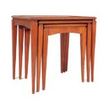 A RETRO VINTAGE TEAK WOOD GRADUATING NEST OF TABLES