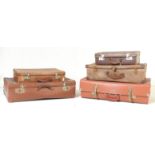 FIVE VINTAGE MID CENTURY TAN LEATHER SUITCASES