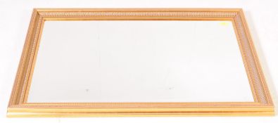 CONTEMPORARY GILT FRAMED WALL HANGING BEVELED MIRROR