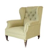 A 19TH CENTURY VICTORIAN WING BACK ARMCHAIR