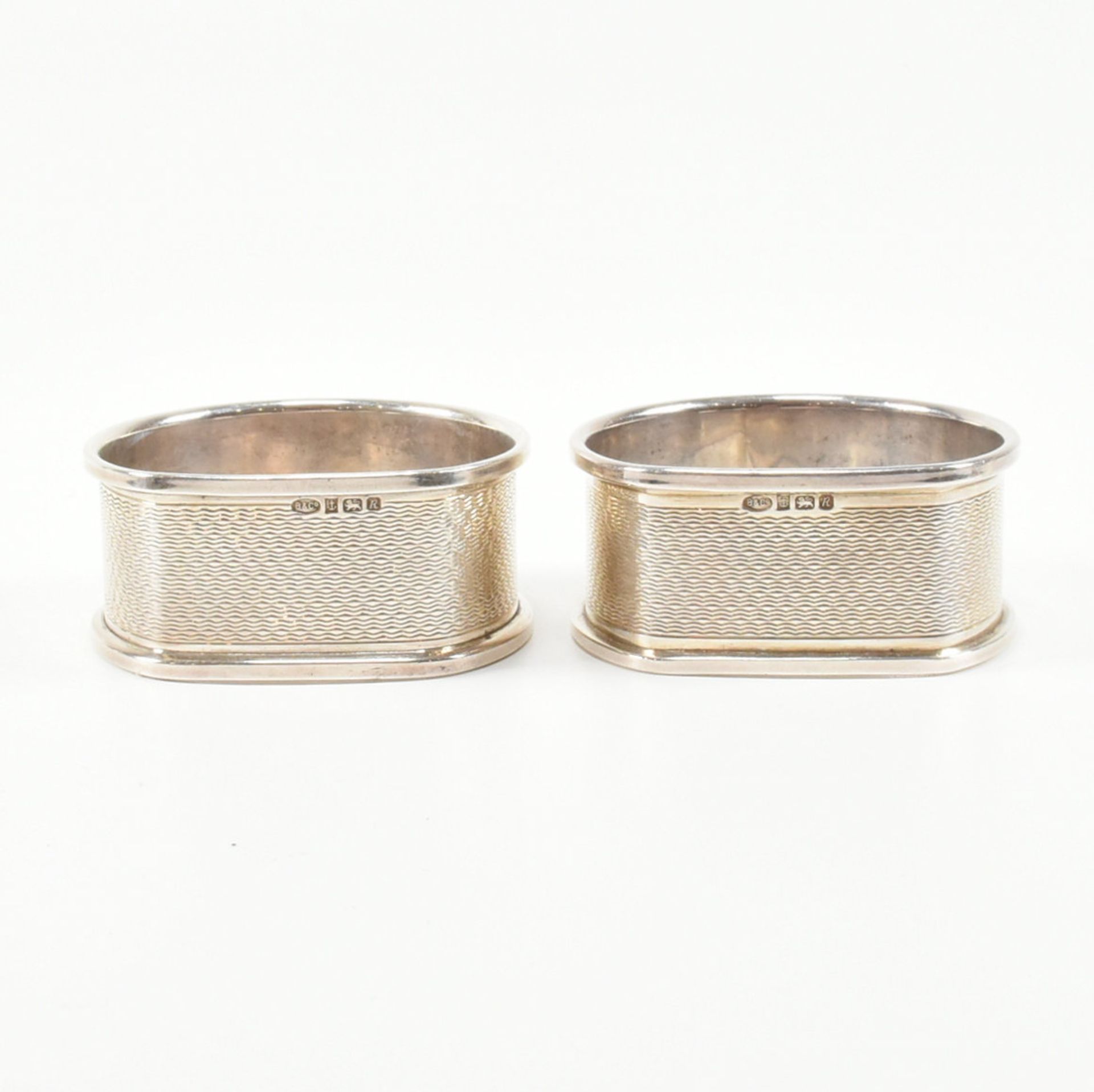 FIVE HALLMARKED SILVER NAPKIN RINGS - Image 4 of 13