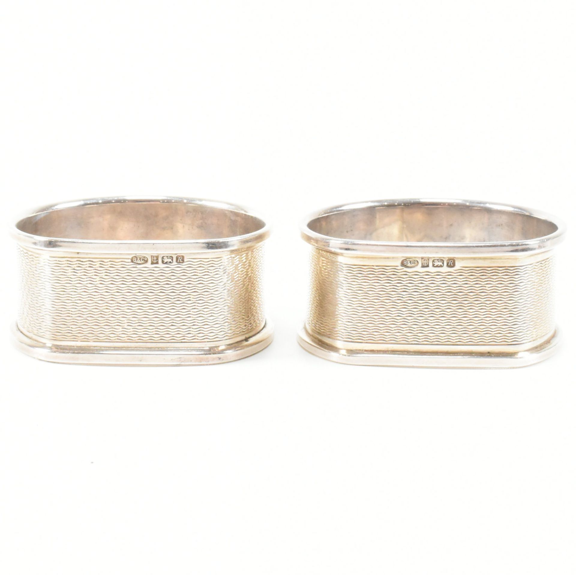 FIVE HALLMARKED SILVER NAPKIN RINGS - Image 5 of 13