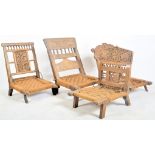 FOUR EARLY 20TH CENTURY WOODEN INDIAN PIDA RAJASTHANI CHAIRS