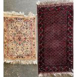 TWO EARLY 20TH CENTURY PERSIAN FLOOR PRAYER RUGS