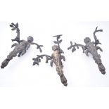 THREE VICTORIAN CAST BRONZE PUTTI WALL LIGHT FITTINGS