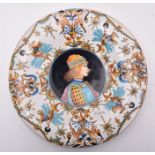 20TH CENTURY ITALIAN MAJOLICA PLATE FEATURING PAINTED BOY