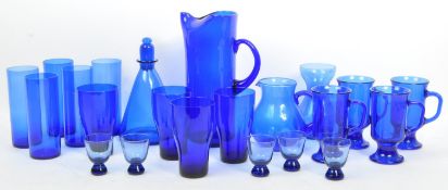 QUANTITY OF BLUE GLASS DRINKING GLASSES JUGS & VASE