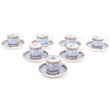 SEVEN EARLY 20TH CENTURY 'ROYAL LILLY' PATTERN CUPS & SAUCERS