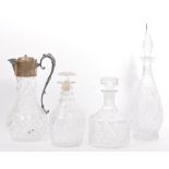 FOUR 20TH CENTURY SILVER PLATED CUT GLASS DECANTERS