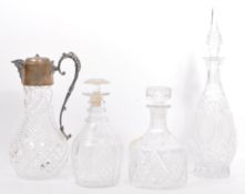 FOUR 20TH CENTURY SILVER PLATED CUT GLASS DECANTERS