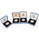 SET OF FOUR ROYAL MINT SILVER PROOF ONE POUND / £1 COINS