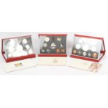 THE ROYAL MINT - THREE UNITED KINGDOM DELUXE PROOF COIN SETS