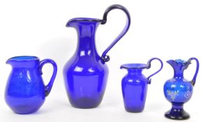 BRISTOL BLUE - COLLECTION OF BLUE GLASS HANDLED JUGS