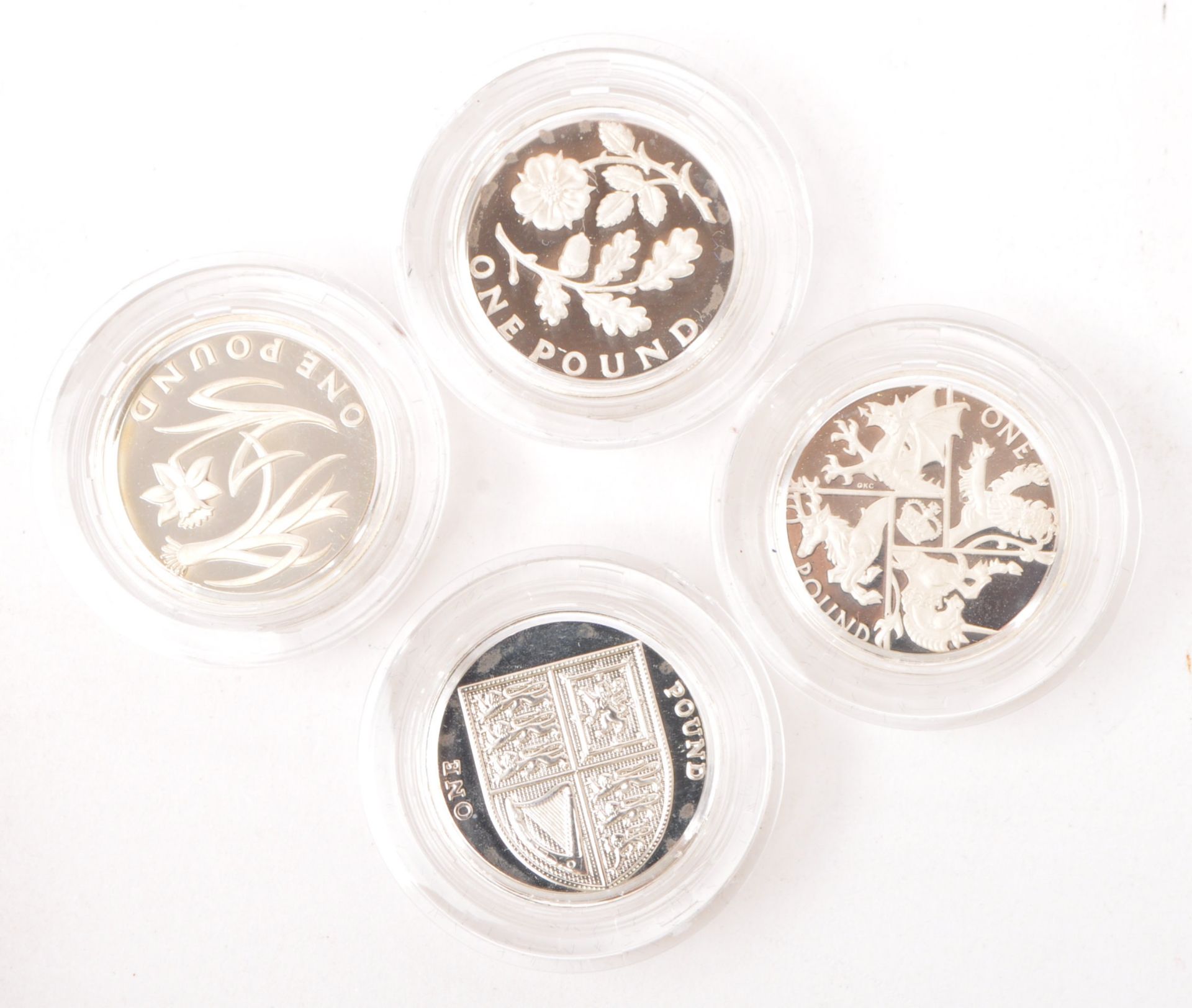 SET OF FOUR ROYAL MINT SILVER PROOF ONE POUND / £1 COINS