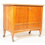 MID CENTURY 1950S WALNUT METAMORPHIC COCKTAIL CABINET