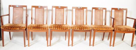FOUR VINTAGE G PLAN MAHOGANY DINING CHAIRS WITH RATTAN BACKS