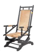 AESTHETIC MOVEMENT STYLE EBONISED & COW SKIN ROCKING CHAIR