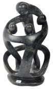 20TH CENTURY SHONA SOAPSTONE OF FOUR EMBRACING FIGURES