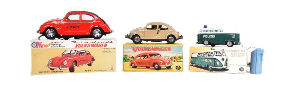 TINPLATE TOYS - THREE JAPANESE BATTERY OPERATED VOLKSWAGEN CARS