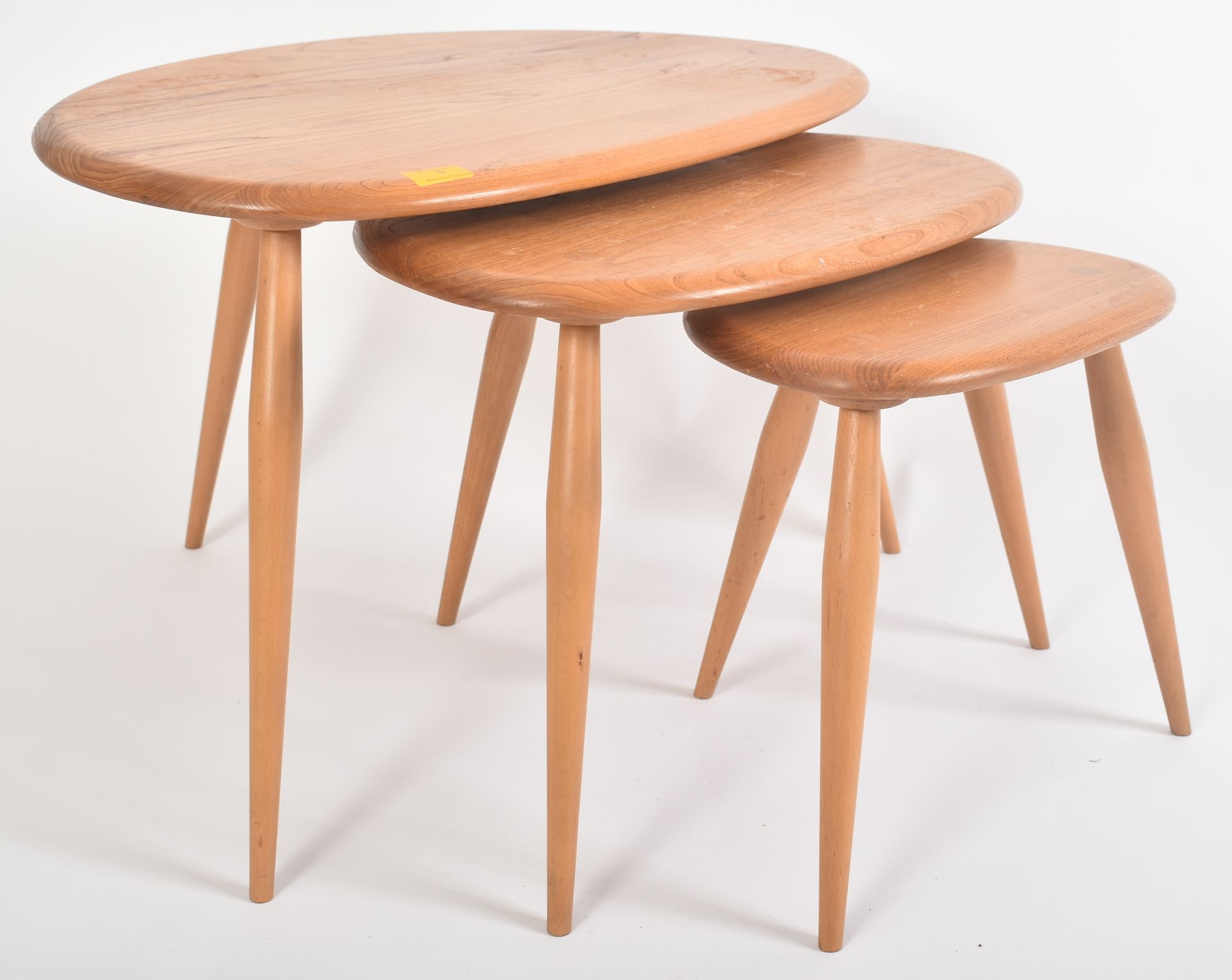 ERCOL - MID CENTURY BEECH AND ELM NEST OF TABLES