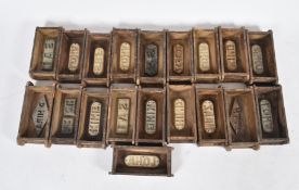 NINETEEN MID 20TH CENTURY INDUSTRIAL BRICK MOULDS