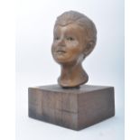 20TH CENTURY PLASTER HAND SCULPTED BOY'S HEAD ON STAND