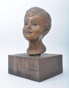 20TH CENTURY PLASTER HAND SCULPTED BOY'S HEAD ON STAND