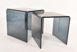 CONTEMPORARY SMOKED GLASS NEST OF TWO GRADUATING TABLES