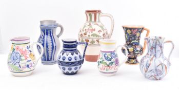 COLLECTION OF SEVEN 20TH CENTURY CONTINENTAL JUGS