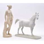 TWO EARLY 20TH CENTURY DECORATIVE PARIAN FIGURINES