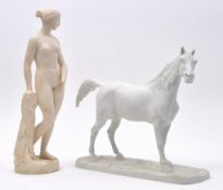 TWO EARLY 20TH CENTURY DECORATIVE PARIAN FIGURINES