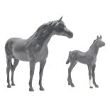 ROYAL DOULTON - TWO MATTE BLACK CERAMIC HORSE FIGURINES
